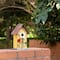 Glitzhome® Distressed Wooden Birdhouse with Flower